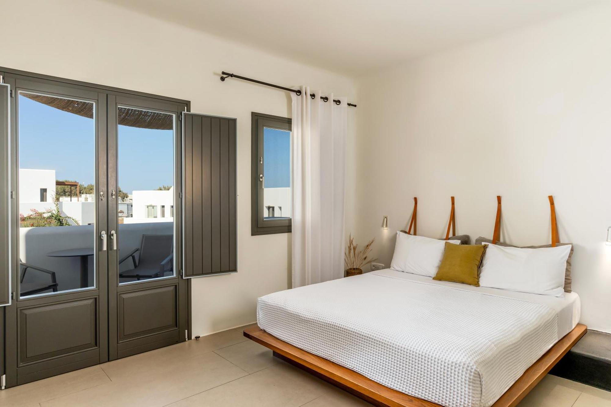 Orama Hotel & Spa ثيرا المظهر الخارجي الصورة A bedroom at the hotel